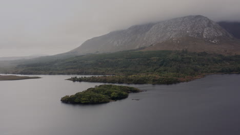misty mountain lake and islands