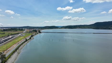 aerial shot along the shoreline of fidalgo bay near anacortes, wa