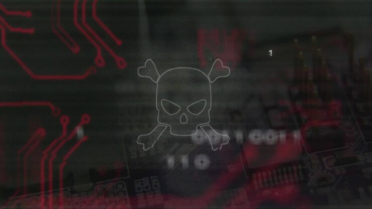 Skull and crossbones with binary code animation over electronic circuit board