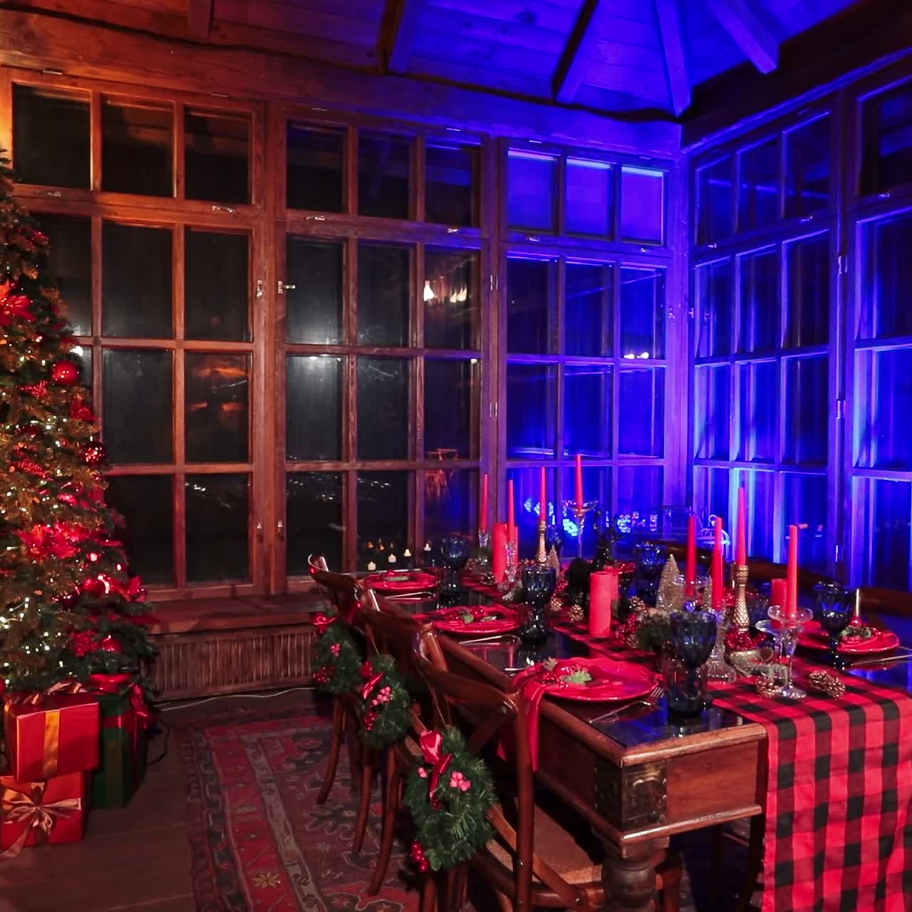 Festively decorated room for family celebration on winter holidays. Bright décor in the old-fashionable country house