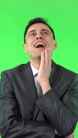 businessman laughing on green screen
