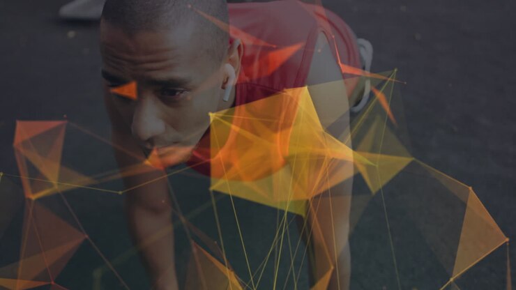 Animation of rotating yellow network over male runner on starting blocks