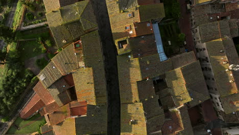 tiled roofscape at san gimignano medieval town in siena, tuscany, north-central italy