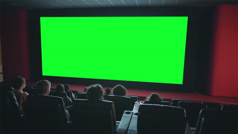 movie theater audience watching green screen