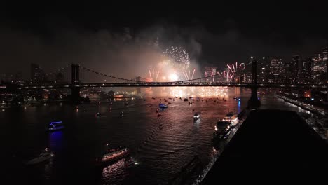 night drone view of macy's fourth of july fireworks celebration in new york