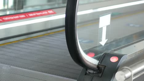 closeup of a downward escalator