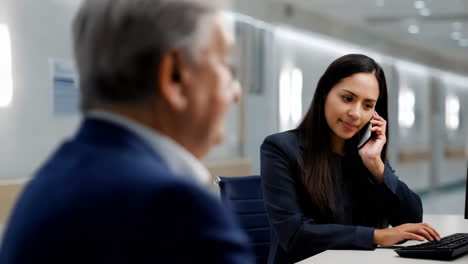 businesswoman on phone call in hospital office