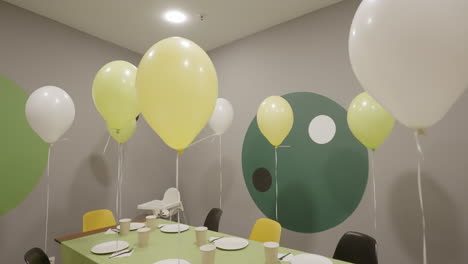 children's party room with balloons and decorations