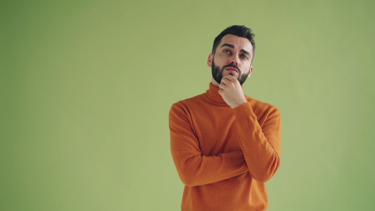 Man in Orange Sweater, Thinking