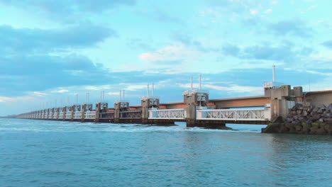 the stormsurge barrier locks at low tide in the south west of the netherlands