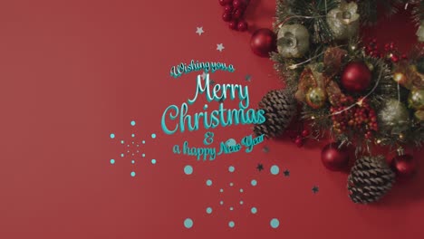 Animation-of-merry-christmas-text-over-decorations