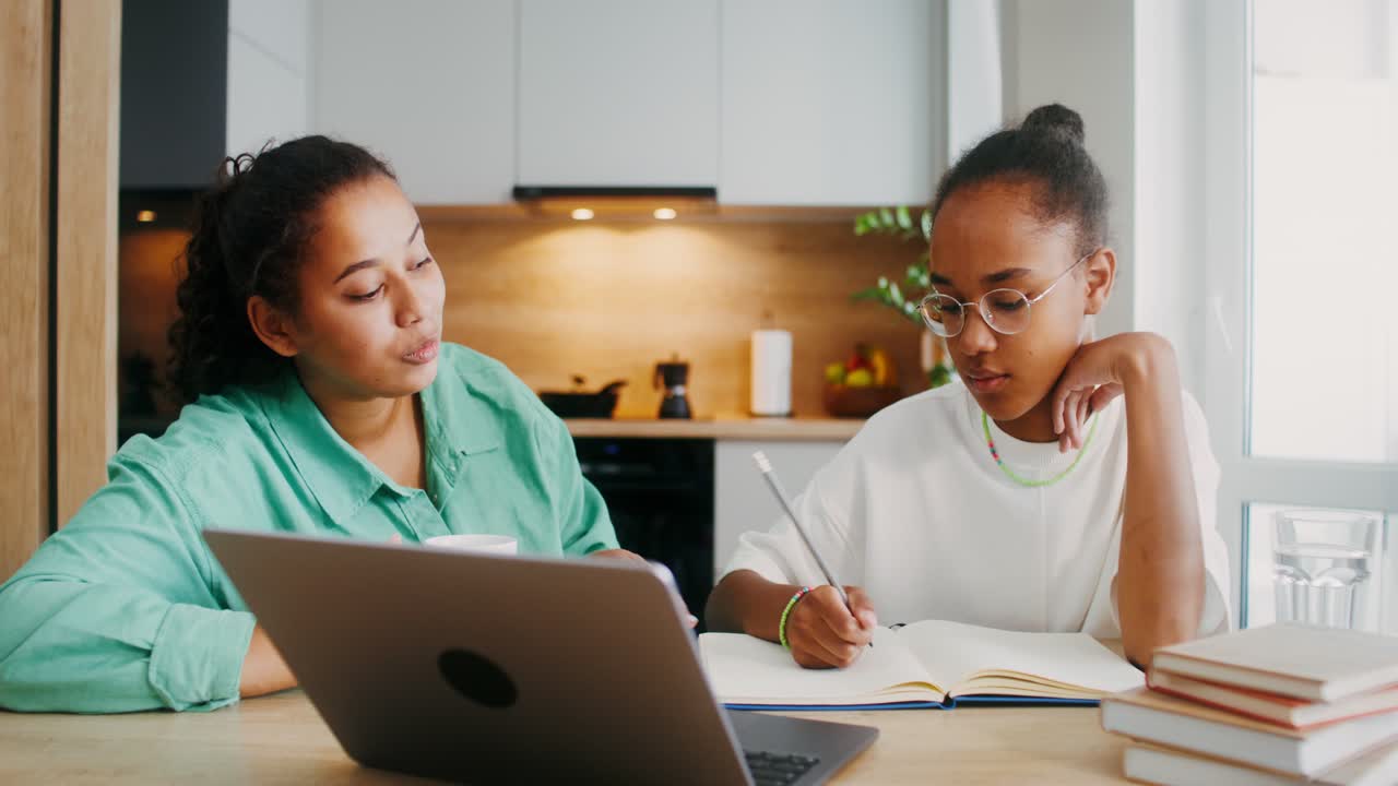Sisters studying at home