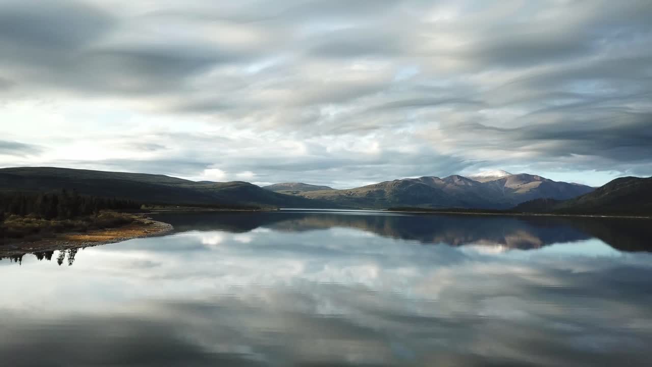 Perfect clouds reflections on Fish Lake near Whitehorse, Yukon Canada