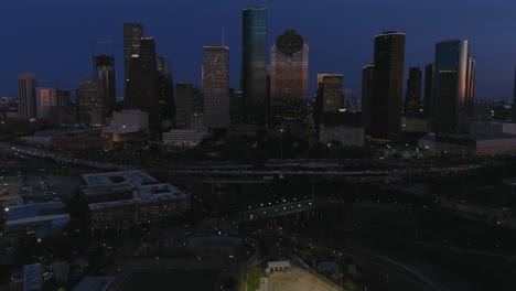 4k aerial view of downtown houston at night