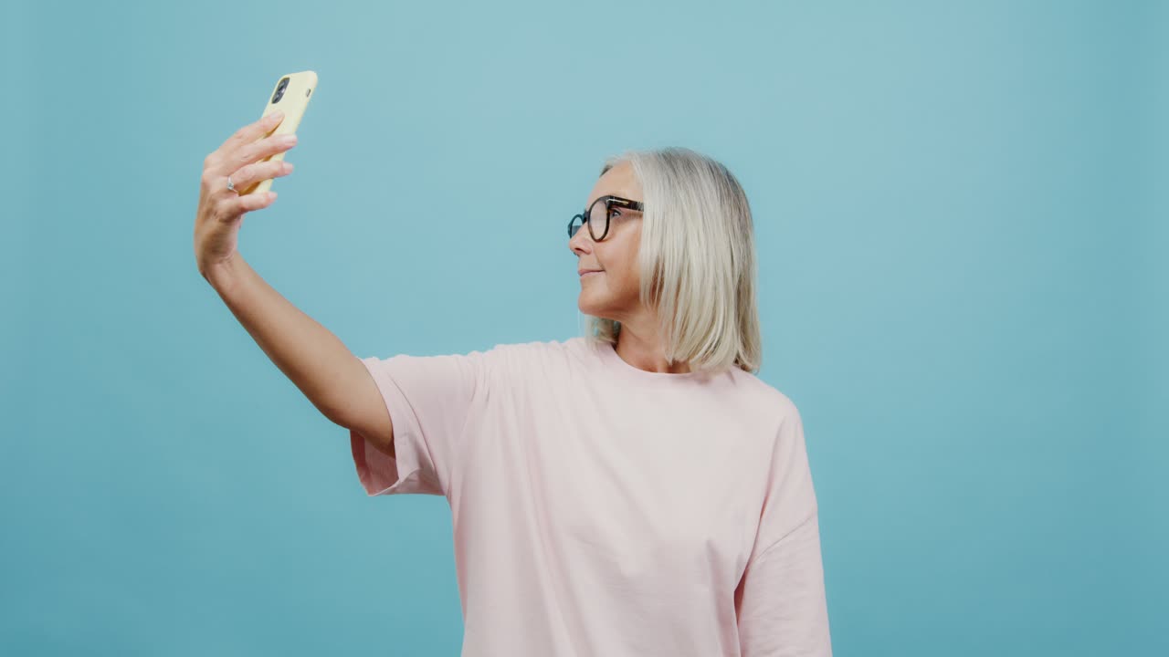 Senior woman taking a selfie