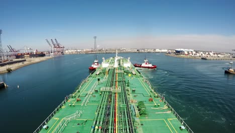 Timelapse-oil-tanker-bow-berth-long-Beach-Los-Angeles-tug-boat-summer-sunny-day