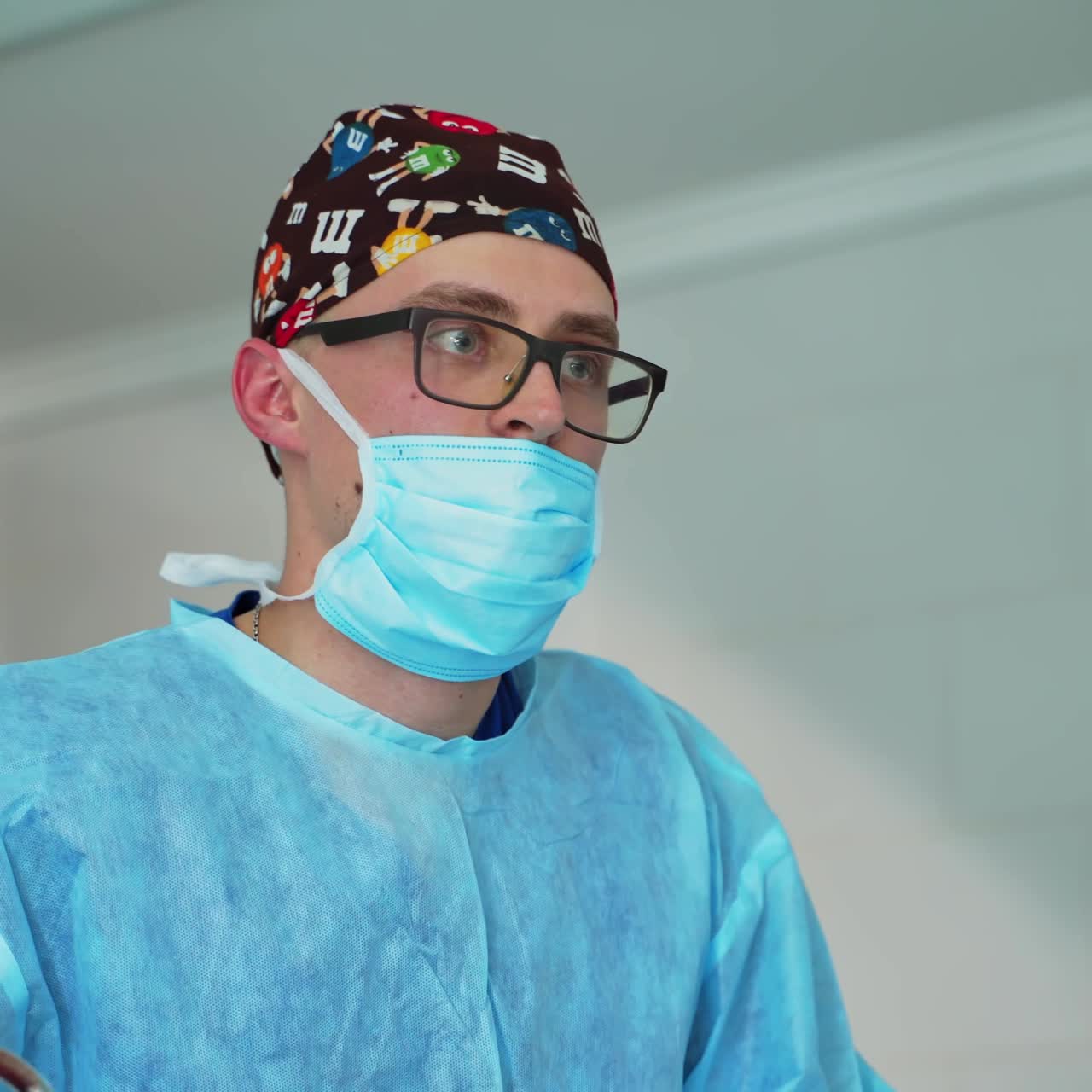 Working surgeon in operating theatre