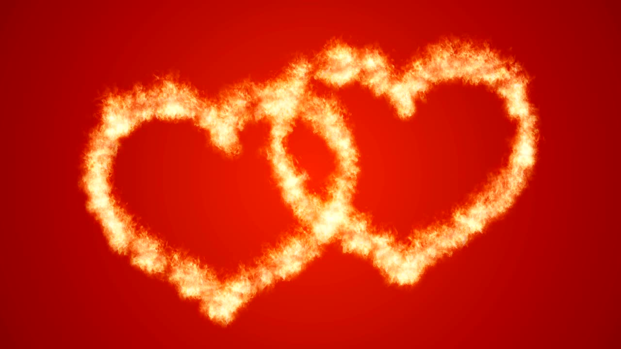 Due cuori ardenti su sfondo rosso. Loop continuo
