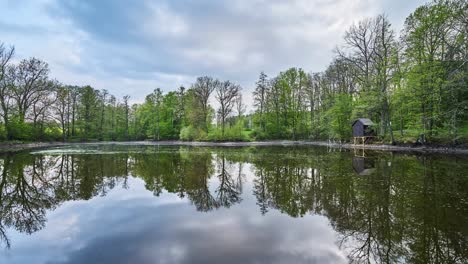 Time-lapse-of-clouds-over-little-pond