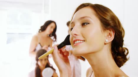 bride getting ready for wedding and bridesmaids in background 4k 4k