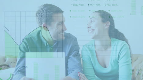 animation of stock market data processing over caucasian couple calculating finances at at home