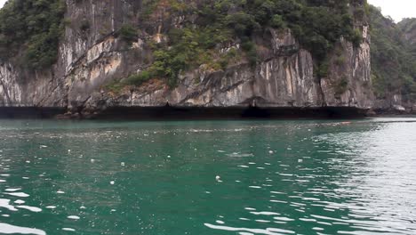 pollution-by-plastic-floating-in-Halon-Bay,-Vietnam,-wasting-a-paradise