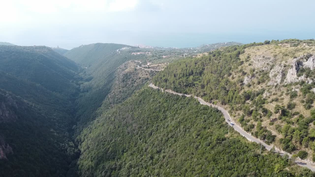 Aerial landscape view of a hillside country road in the Apennine mountains, Italy