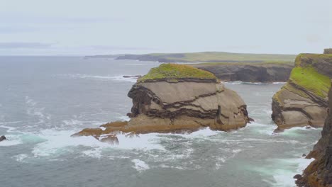dramatic sea stacks and cliffs on a rugged coast