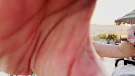 woman vlogging rooftop view of athens cityscape at dusk