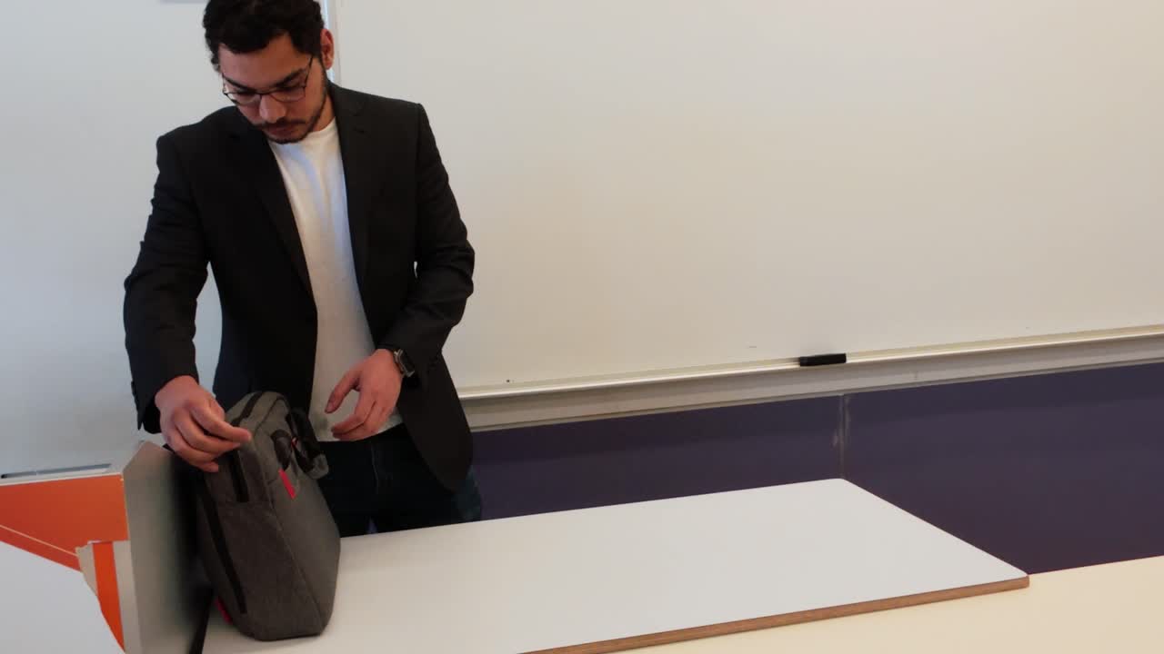 University Professor Enters Lecture Room