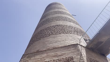 travel view of burana tower in chüy valley, kyrgyzstan – ancient minaret and ruins