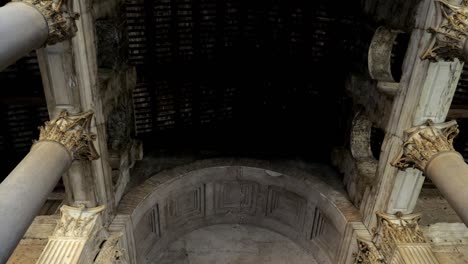 the closeup view on the bronze doors of the pantheon and granite columns