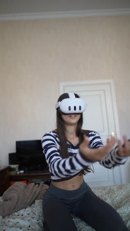 woman using vr headset in bedroom