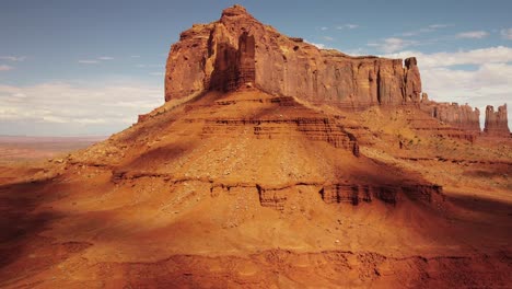 massive rock formation in monument valley desert