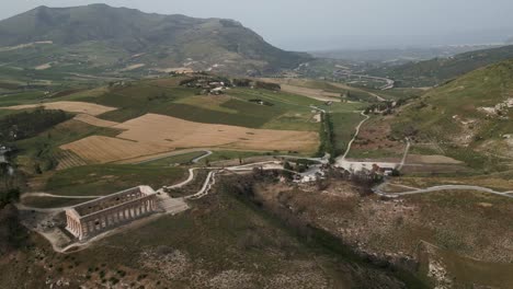 Aerial-of-Archaeological-Park-of-Segesta-ruins-in-Sicily-,-Italy