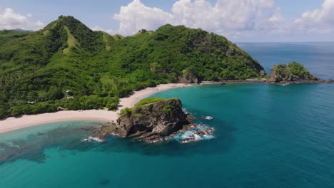 aerial drone shot of koka beach at the coast of flores island, indonesia