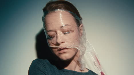 a woman wrapped in plastic
