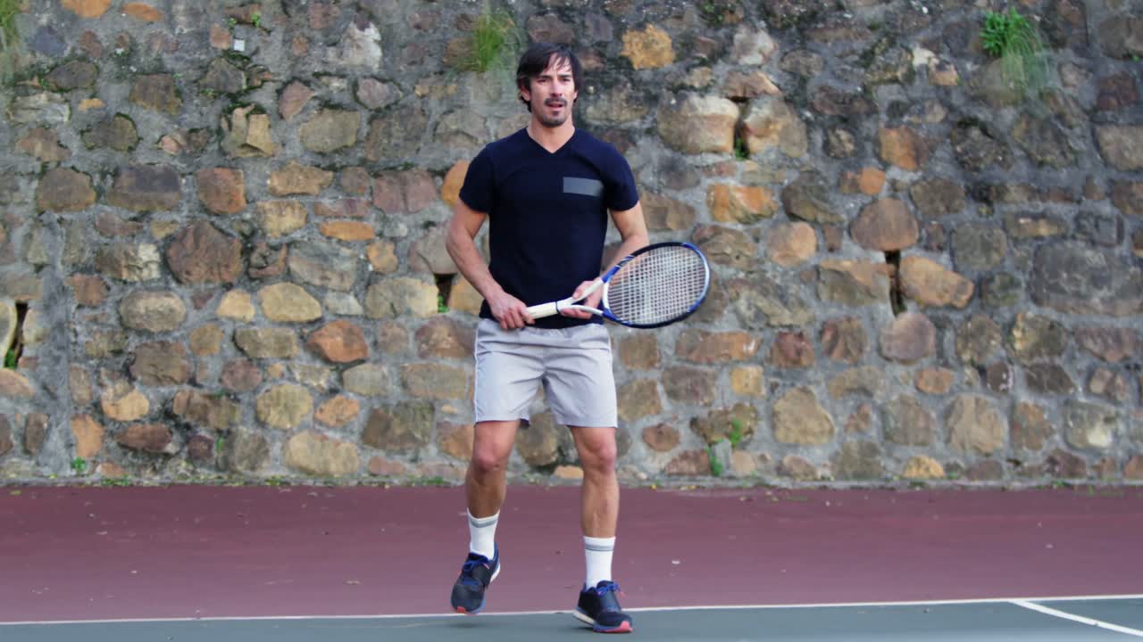 Active man playing tennis