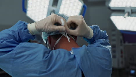 surgery, hospital and doctor tie mask in operating