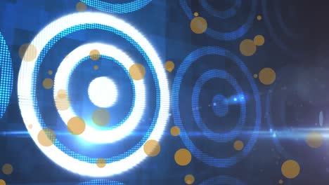 animation of yellow dots over circles on navy background