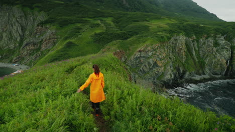 woman hiking on a coastal trail