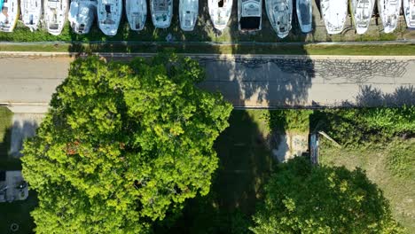 Tilting-and-moving-forward-over-homes-and-Muskegon-Lake