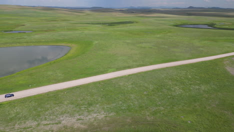 Long-Stretch-of-Dirt-Road-in-Montana-Countryside