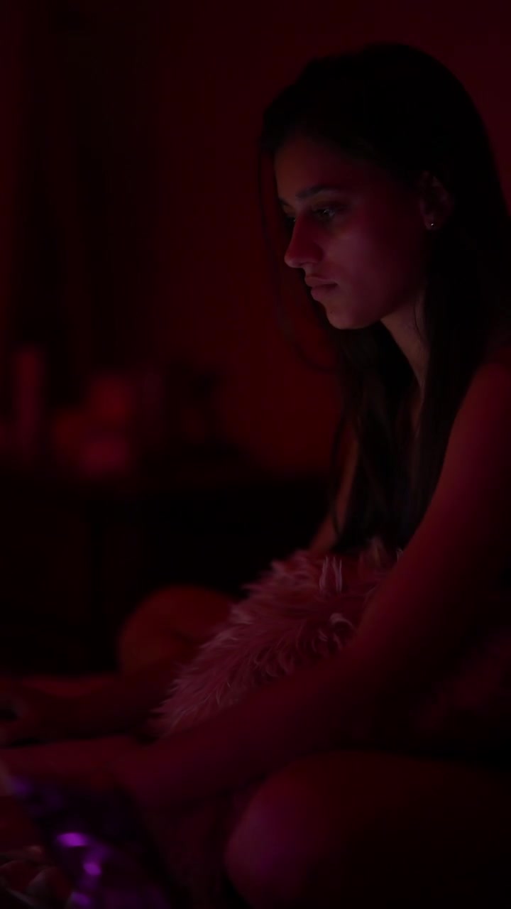 Young Woman in a Dark Room