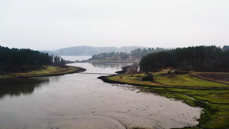 Misty-Coastal-Landscape-at-Strait,-Stigfjorden,-Orust,-Bohuslan,-Sweden