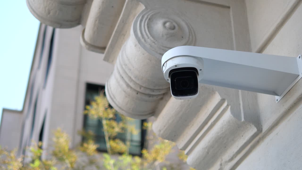 Security camera on building wall