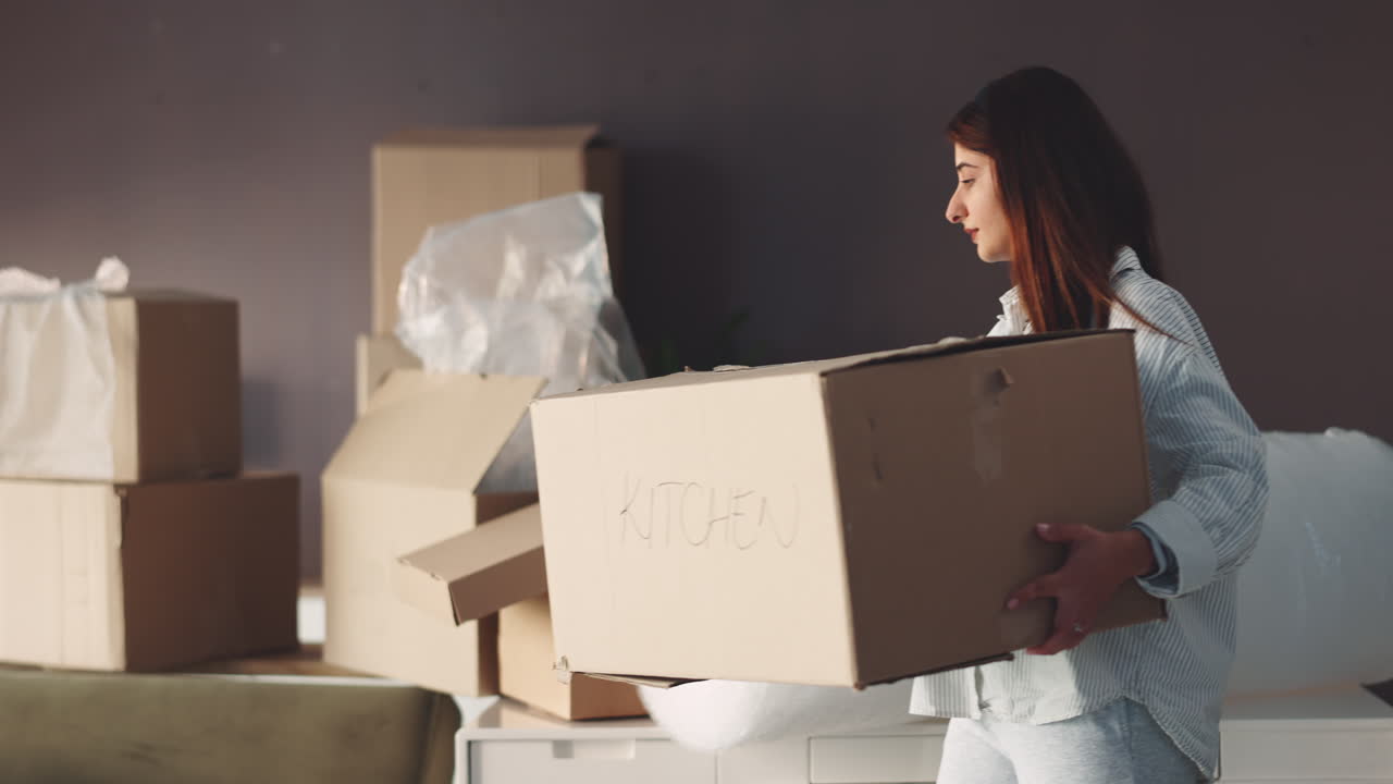Moving Day: Woman with Cardboard Boxes
