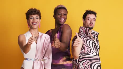 three trans men gesturing to be fine with the thumb up
