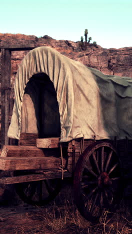 vintage covered wagon in the desert