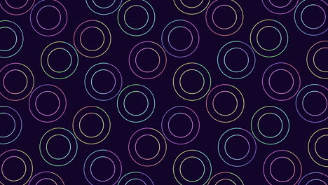 Neon rainbow rings pattern in rows on black gradient